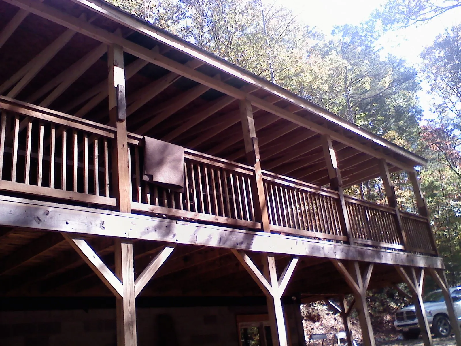 Timber framing under a new elevated porch and deck — Roof Leak Repair in New Bloomfield by Roofing Brothers